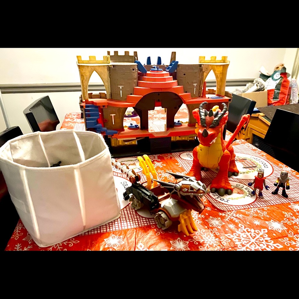 Imaginext castle, dragon, cart, and pieces